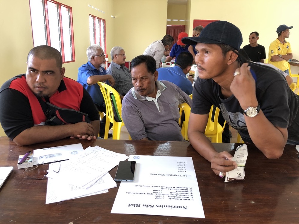 Conducting a seminar with farmers