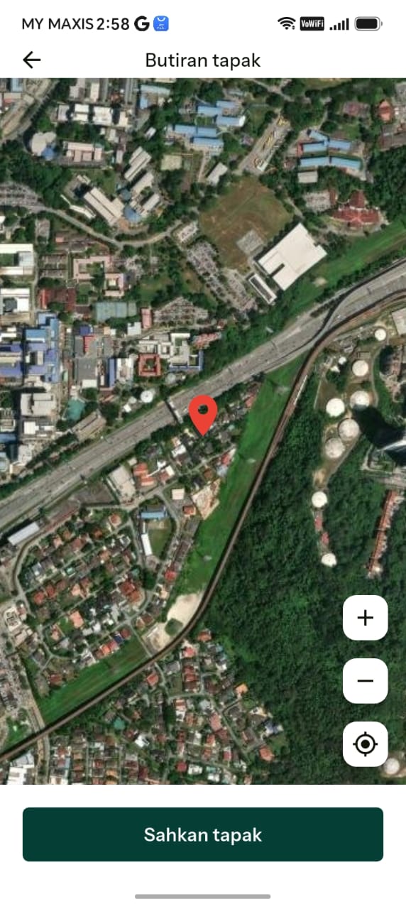 Map screen with a red marker being positioned over the plot